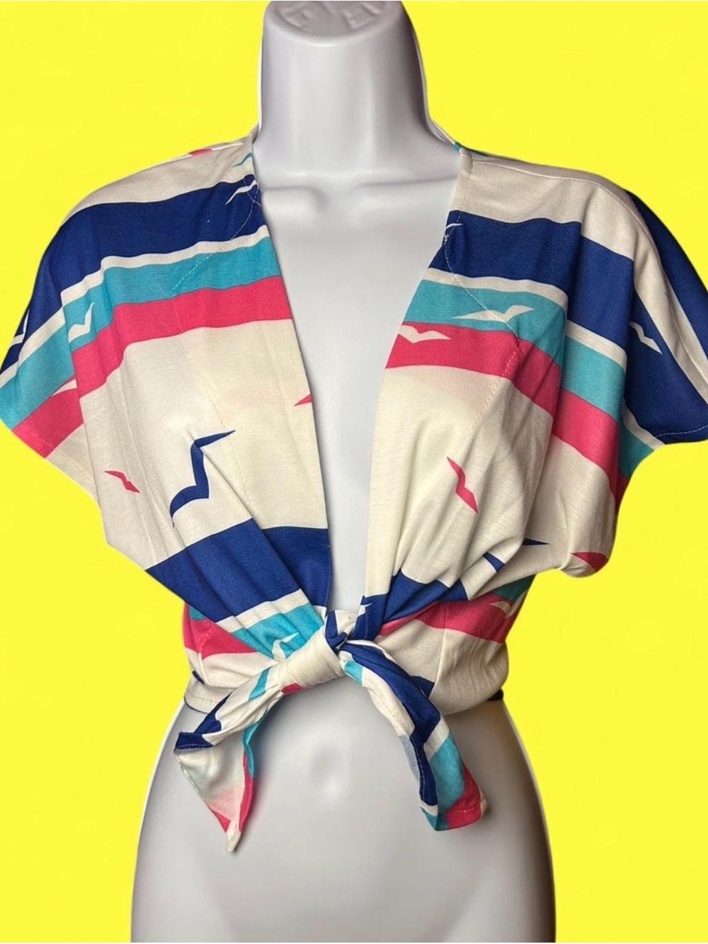 Vintage 1970’s tie-front top. Bold horizontal stripes and bird print